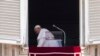 Pope Francis leaves after reciting the Regina Coeli noon prayer from the window of his studio overlooking St. Peter's Square, at the Vatican, June 26, 2022.