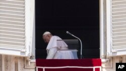 Pope Francis leaves after reciting the Regina Coeli noon prayer from the window of his studio overlooking St. Peter's Square, at the Vatican, June 26, 2022.