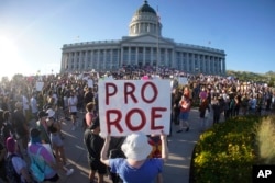 People attend an abortion-rights protest at the Utah State Capitol in Salt Lake City after the Supreme Court overturned Roe v. Wade, Friday, June 24, 2022. (AP Photo/Rick Bowmer)