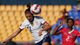 Jwez Ameriken Alex Morgan pandan yon match CONCACAF kont Ayiti nan Monterrey, Meksik, Lendi 4 Jiye 2022. 