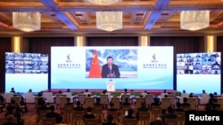 Chinese President Xi Jinping delivers a speech via video at the opening ceremony of the BRICS Business Forum, in Beijing, China, June 22, 2022. (cnsphoto via Reuters)