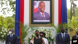 FILE - First lady Martine Moise, center, attends a memorial service for her late husband President Jovenel Moise, at the National Pantheon Museum, in Port-au-Prince, Haiti, July 21, 2021.