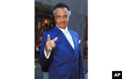 FILE - Tony Sirico who plays Paulie Walnuts on the HBO series 'The Sopranos' arrives for the premiere of the show's fourth season in this Sept. 5, 2002, at New York's Radio City Music Hall.