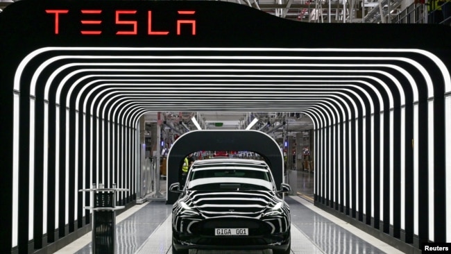 In this file photo, Model Y cars are shown during the opening ceremony of the new Tesla Gigafactory for electric cars in Gruenheide, Germany, March 22, 2022. (Patrick Pleul/Pool via REUTERS)