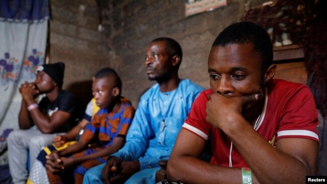 File -The family of Theresa Ogbu, 51, who was a victim of the attack by gunmen on worshippers during a Sunday mass service, attend an interview with Reuters at their home in Owo, Ondo, Nigeria, June 7, 2022.