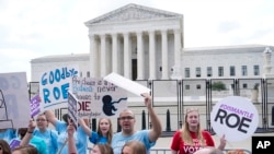 Demonstrators protest about abortion outside the Supreme Court in Washington, Friday, June 24, 2022. 