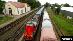 A freight train from the Russian region of Kaliningrad arrives at the border railway station in Kybartai, Lithuania, June 21, 2022. 