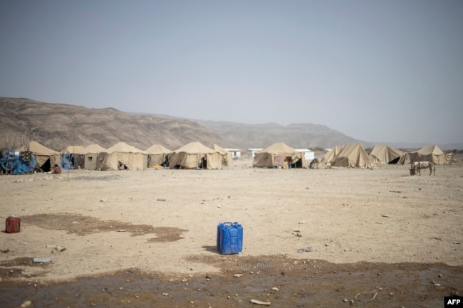 FILE - A water jug is seen at the internally displaced persons camp of Guyah, Afar region, Ethiopia, May 17, 2022.