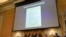 A note is displayed as the House select committee investigating the Jan. 6 attack on the U.S. Capitol holds a hearing at the Capitol on June 28, 2022. 