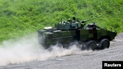 2022年6月16日，台湾军方研制的最新型号装甲车“CM-34云豹八轮装甲车”在南投公开向外界展示。