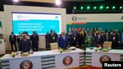 Ghana's President Nana Akufo Addo, ECOWAS Commission President Jean-Claude Kassi Brou and Ivory Coast's President Alassane Ouattara attend the ECOWAS summit to discuss transitional roadmap for Mali, Burkina Faso and Guinea, in Accra, Ghana, July 3, 2022.