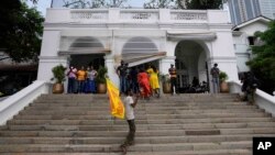 Protesters gather in and around the premisses of prime minister's official residence a day after it was stormed in Colombo, Sri Lanka, July 10, 2022. 