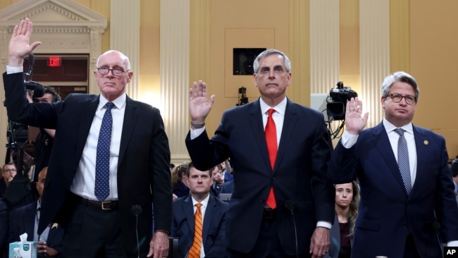 From left, Rusty Bowers, Arizona state House Speaker, Brad Raffensperger, Georgia secretary of state, and Gabe Sterling, Georgia deputy secretary of state, are sworn in as the House select committee investigating the Jan. 6 attack on the U.S. Capitol resumes on June 21, 2022.