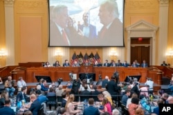 A image of former President Donald Trump talking to his Chief of Staff Mark Meadows is seen as Cassidy Hutchinson, former aide to Trump White House chief of staff Mark Meadows, testifies at the Capitol in Washington, June 28, 2022.