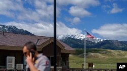 The entrance to Yellowstone National Park, a major tourist attraction, sits closed due to the historic floodwaters on June 15, 2022, in Gardiner, Mont.