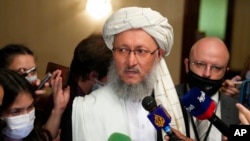 Taliban official Abdul Salam Hanafi, pictured speaking to reporters in Moscow, Oct. 20, 2021, says an all-male meeting of clerics and scholars set for June 30, 2022, in Kabul "will be a positive step for stability in Afghanistan and strengthening national unity."