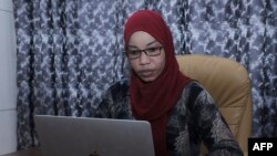 FILE: Nasrin Mohamed Ibrahim, the head of Bilan Media, a Somali start-up staffed entirely by women, is photographed at their headquarters in Mogadishu. 5.22.2022