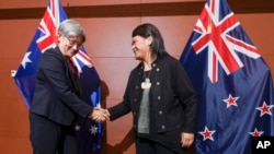 Australian Foreign Minister Penny Wong, left, is welcomed to Parliament House by New Zealand Foreign Minister Nanaia Mahuta ahead of a bilateral meeting in Wellington, New Zealand, June 16, 2022.