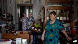 The war-damaged building from Russian aerial bombs, of 70-year-old Valentyna Klymenko, lives alone in her apartment, in Borodyanka, Kyiv region, Ukraine, June 28, 2022.