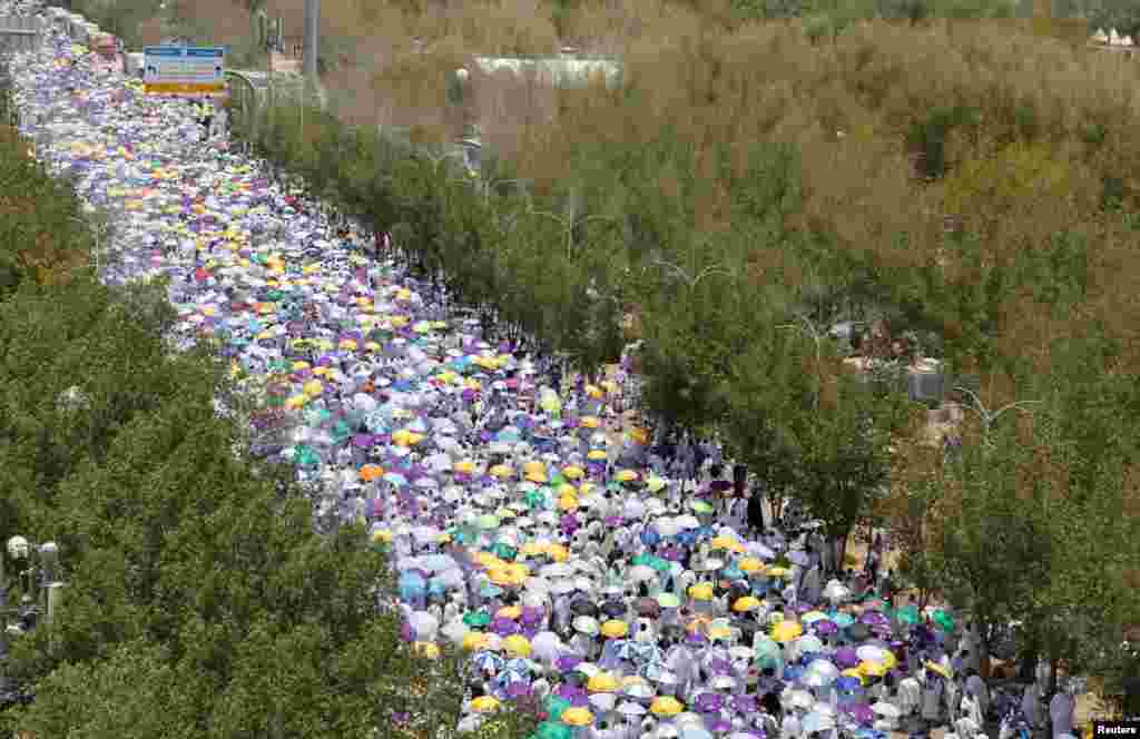 Muslim pilgrims gather on the plain of Arafat during the yearly hajj pilgrimage, outside the holy city of Mecca, Saudi Arabia.