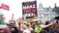 Demonstrators march in a trades union organised protest opposed to British government policies at Parliament Square in London, Britain, June 18, 2022. 
