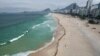 FILE - People create a line along Copacabana beach for a symbolic group hug with the sea on World Oceans Day in Rio de Janeiro, Brazil, June 8, 2022.