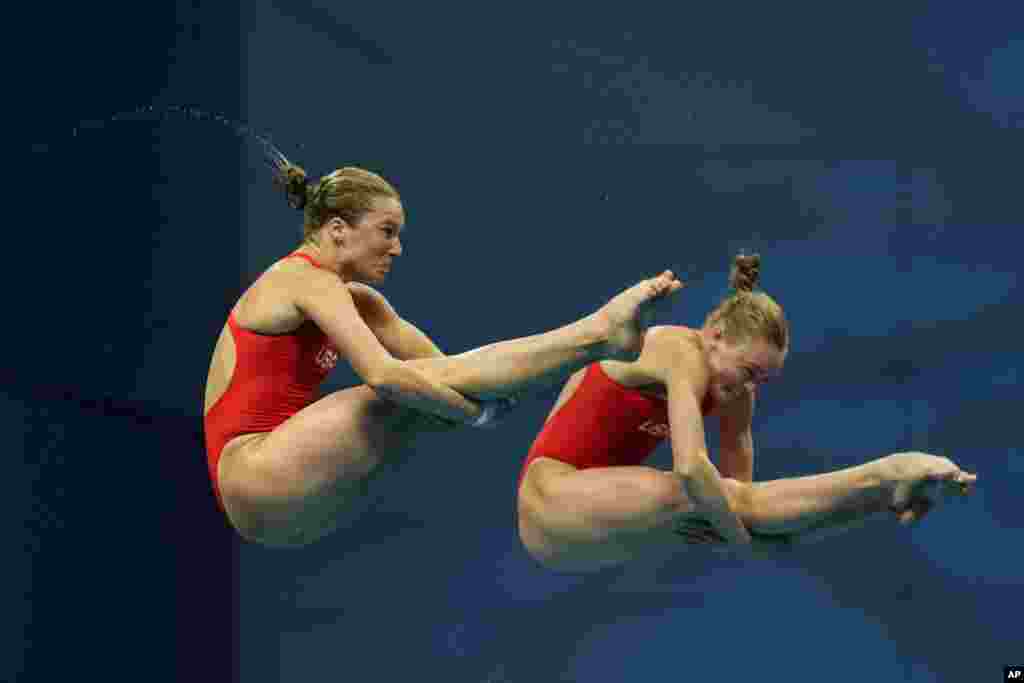 Delaney Schnell and Katrina Young of the United States compete during the women&#39;s diving synchronized 10m platform final at the 19th FINA World Championships in Budapest, Hungary.