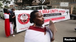 Members of the Maasai ethnic community in Kenya march during a protest against the eviction of their compatriots from their ancestral land in Tanzania, Nairobi, Kenya, June 17, 2022.