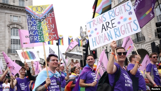 People attend the 2022 Pride Parade in London, July 2, 2022.
