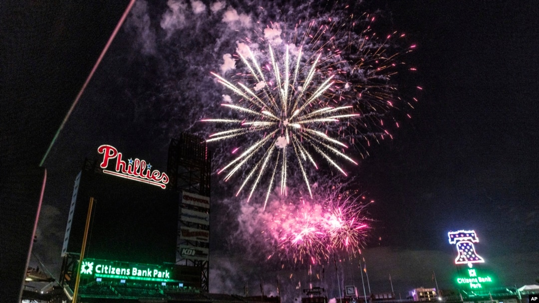 Fireworks erupt in celebration of the Independence Day holiday over Citizens Bank Park after a baseball game between Philadelphia Phillies and St. Louis Cardinals, Sunday, July 3, 2022, in Philadelphia. (AP Photo/Laurence Kesterson)
