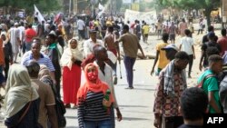 FILE - Sudanese protesters take to the streets in the southern area of the capital Khartoum on 7.1.2022, a day after a mass demonstration joined by tens of thousands was met with the deadliest violence so far this year. 