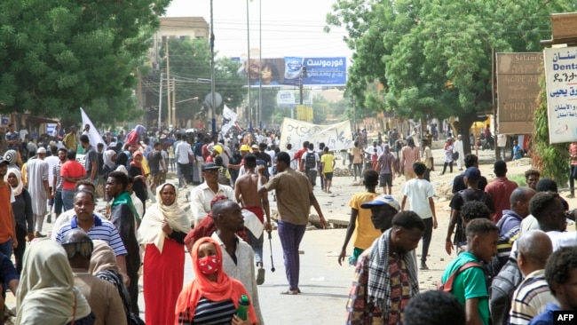 FILE - Sudanese protesters take to the streets in the southern area of the capital Khartoum on July 1, 2022, a day after a mass demonstration joined by tens of thousands was met with the deadliest violence so far this year.