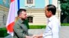 In this photo released by Indonesian Presidential Palace, Indonesian President Joko Widodo, right, shakes hands with his Ukrainian counterpart, Volodymyr Zelenskyy, during their meeting in Kyiv, Ukraine, June 29, 2022.