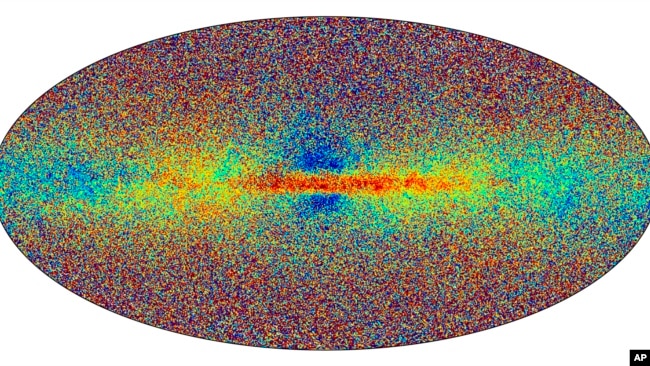 This all-sky view provided by European Space Agency on Monday, June 13, 2022 shows a sample of the Milky Way stars in Gaia’s data release 3. The colour indicates the stellar metallicity. Redder stars are richer in metals. (ESA Handout via AP)