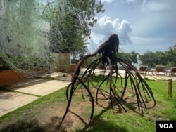 A sculpture by artist Fabrice Monteiro at Oceanium in Dakar, Senegal. (Annika Hammerschlag/VOA News)