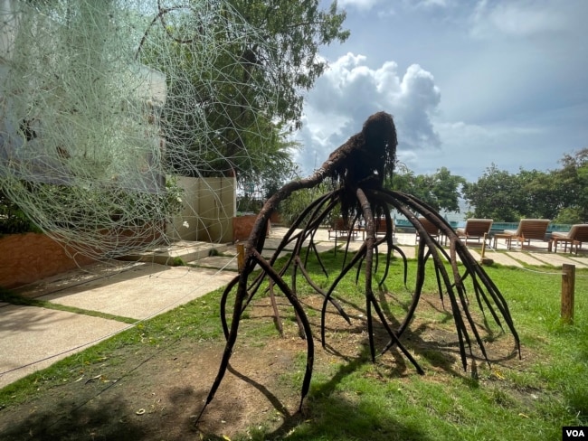 A sculpture by artist Fabrice Monteiro at Oceanium in Dakar, Senegal. (Annika Hammerschlag/VOA News)