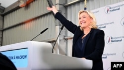 French far-right party Rassemblement National (RN) leader Marine Le Pen delivers a speech after the first results of the parliamentary elections in Henin-Beaumont, northern France, June 19, 2022.