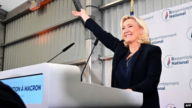 French far-right party Rassemblement National (RN) leader Marine Le Pen delivers a speech after the first results of the parliamentary elections in Henin-Beaumont, northern France, June 19, 2022.