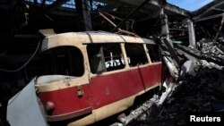 A damaged tram is pictured at a shelled tram depot, amid Russia's attack on Ukraine, in Kharkiv, Ukraine, June 15, 2022.
