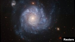 A 2005 image of the spiral galaxy NGC 1309, the location of a supernova that did not result in the death of a white dwarf star. (Photo Credit: NASA, ESA, The Hubble Heritage Team, STSCI/AURA, and A. Riess/Handout via REUTERS) 