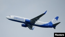FILE - A Boeing 737-800 plane of Belarusian state carrier Belavia takes off at the Domodedovo Airport outside Moscow, Russia, May 28, 2021. 