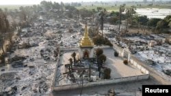 FILE - An aerial view of Bin village of the Mingin Township in Sagaing region, Myanmar, after villagers say it was set ablaze by the military, Feb. 3, 2022.