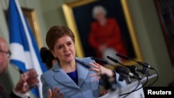 FILE - Scotland’s First Minister Nicola Sturgeon speaks at a news conference on a proposed second referendum on Scottish independence, at Bute House in Edinburgh, Scotland, June 14, 2022. 