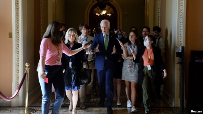 U.S. Sen. John Cornyn (R-Texas) is questioned by reporters at the U.S. Capitol in Washington, June 21, 2022.