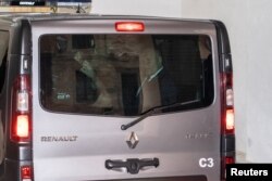 FILE - George Degiorgio, the man accused of detonating a car bomb that killed Maltese journalist Daphne Caruana Galizia in 2017, is transported from the Courts of Justice in Valletta for the Corradino Correctional Facility, in Malta, March 9, 2021.