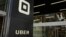 FILE - Signage is seen in front of the building that houses the headquarters of Uber, in San Francisco, California, June 21, 2017.