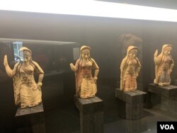 Various figurines are displayed in the Rescued Art Museum in Rome. (Sabina Castelfranco/VOA)