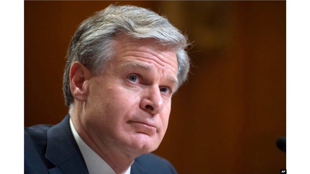 FILE - Director of the Federal Bureau of Investigation Christopher Wray testifies during a Senate Appropriations Subcommittee hearing in Washington, May 25, 2022. He and the leader of Britain's domestic intelligence agency raised alarms about the Chinese government on Wednesday.