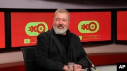 Novaya Gazeta editor Dmitry Muratov at the Ekho Moskvy (Echo of Moscow) radio station live broadcast in Moscow, Russia, Oct. 8, 2021. He plans to auction off his medal to raise funds for children displaced by the invasion of Russian forces.