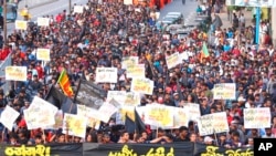 Students shout anti-government slogans during a protest march in Colombo, Sri Lanka, July 8, 2022.